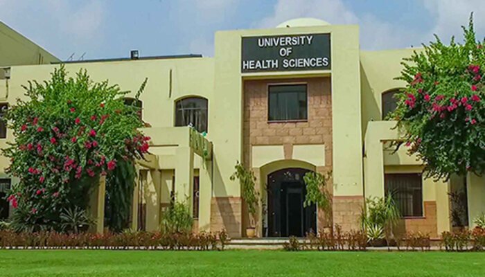 Main building of the University of Health Sciences, Lahore, with its name sign above the entrance